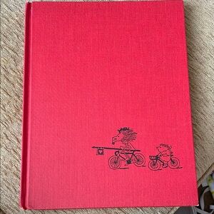 War and Peas 1974
Red Hardcover Book with Bicycle Illustration